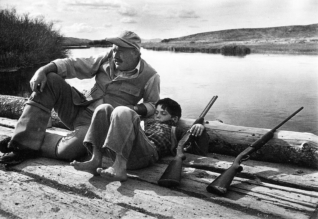 Robert Capa, Ernest Hemingway and his son Gregory, Sun Valley, October 1941